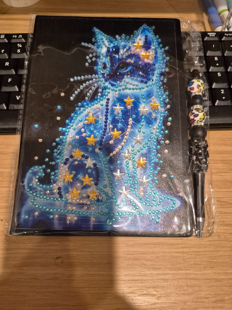 Seahorse Creations AU Notebook - glowing cat and pen, blank A5