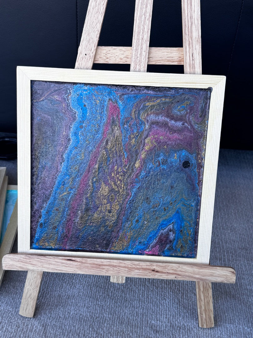 Marie-Line's abstract art framed "Colourful waves in the shades of Blue, pink, gold, black and white", multicolour 22x22cm