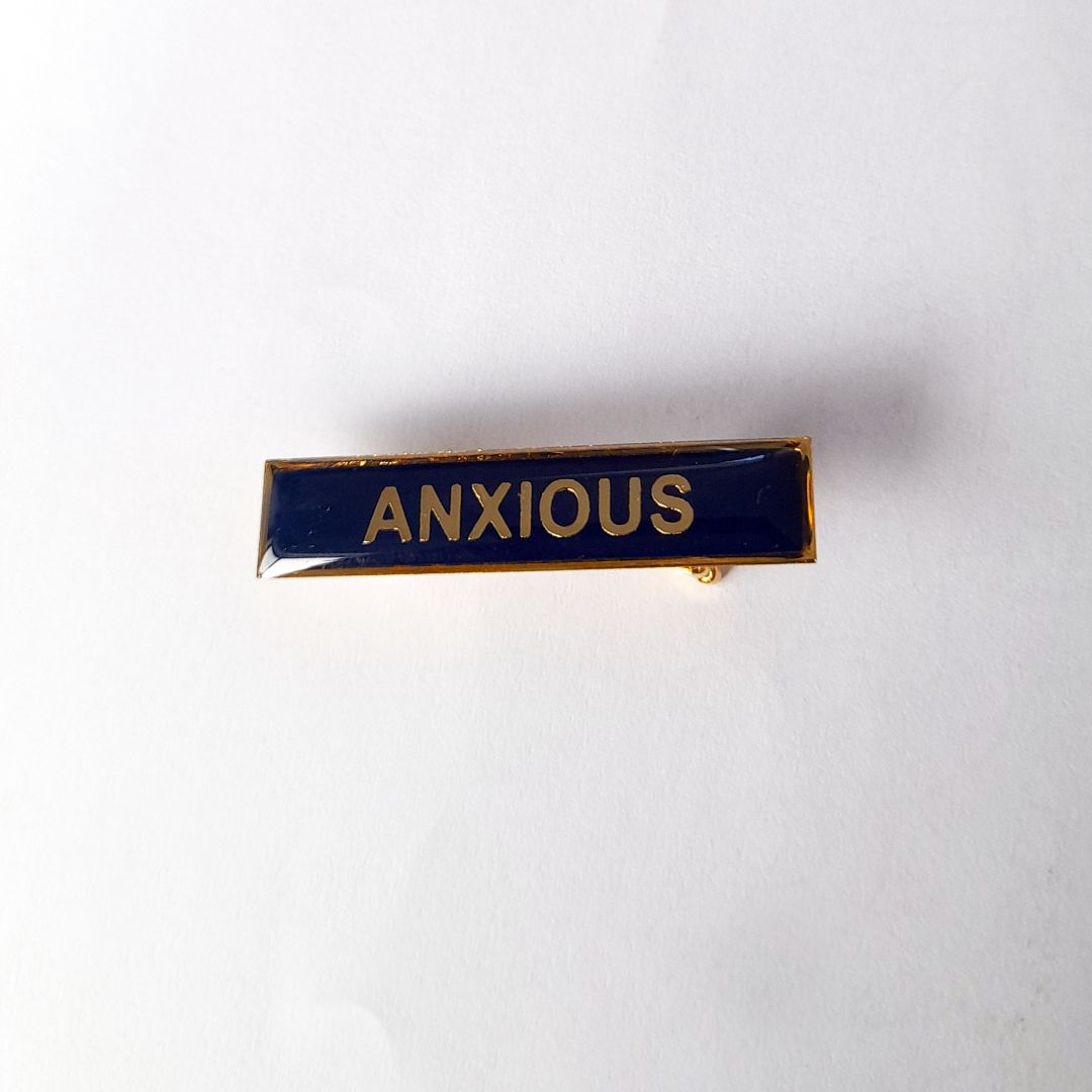 Tegan Iversen Anxious badge, navy 3.8cm x .6cm