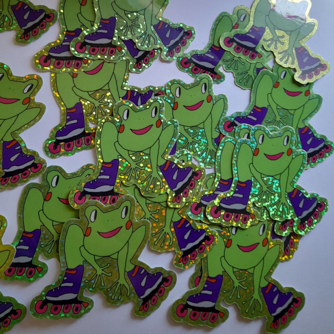 Tegan Iversen Rollerbladin' froggo sticker, green 5cm x 5cm