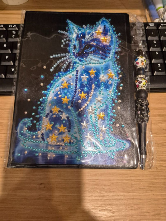Seahorse Creations AU Notebook - glowing cat and pen,  blank A5