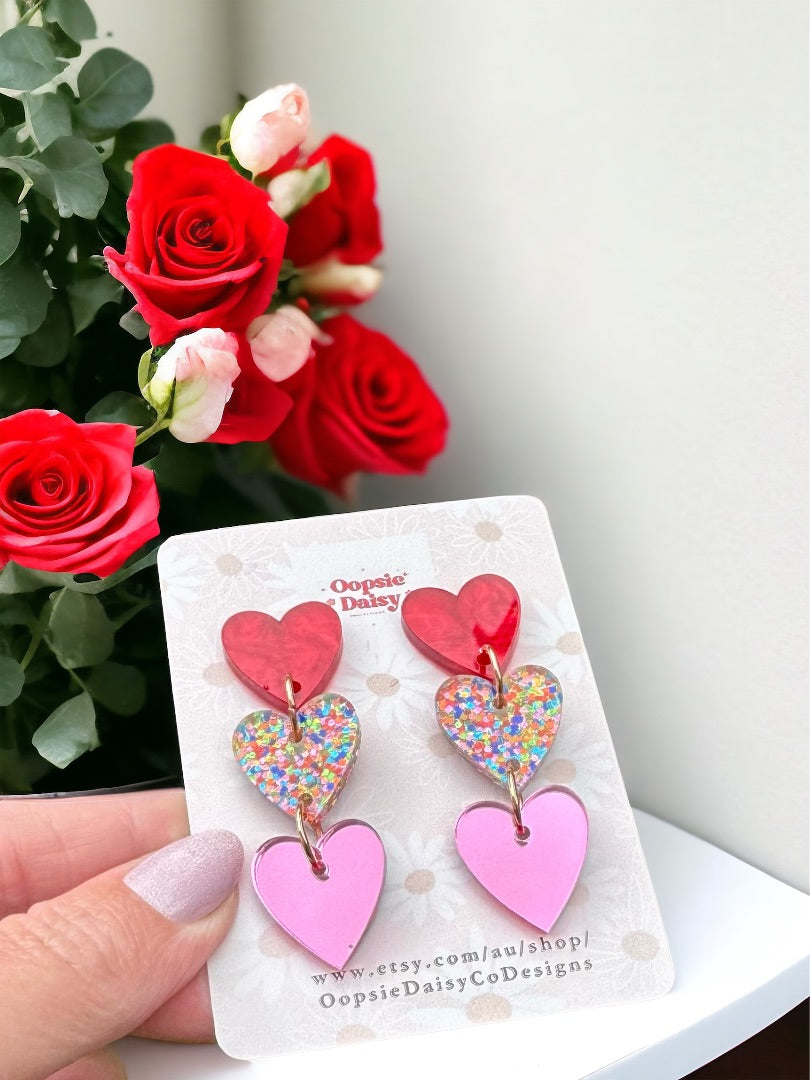 Oopsie Daisy Collections Trio Heart Dangle,  Pink