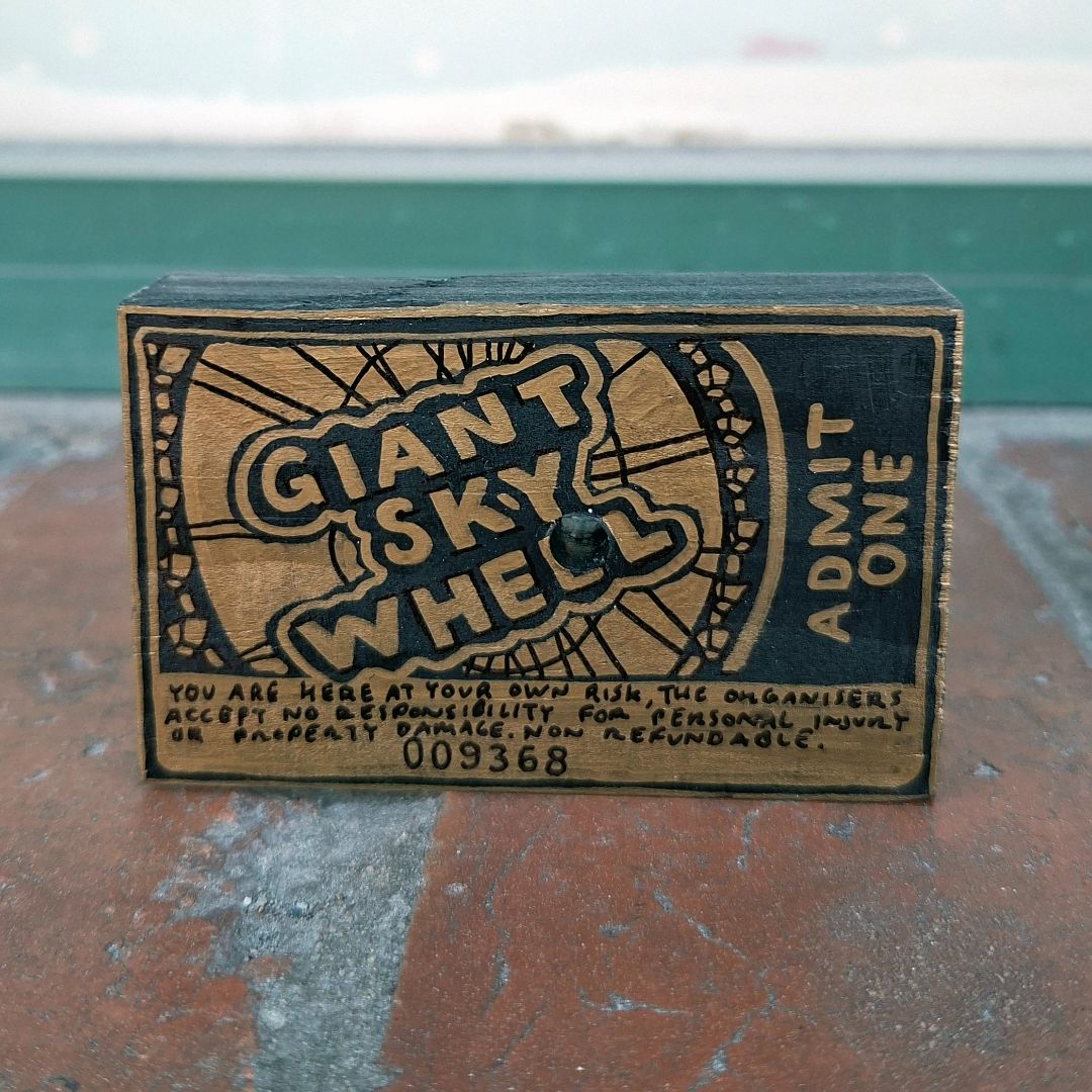 Tegan Iversen Giant sky wheel ticket artwork,  gold 8cm x 5cm x 2cm