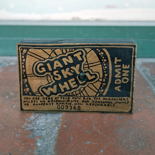 Tegan Iversen Giant sky wheel ticket artwork,  gold 8cm x 5cm x 2cm