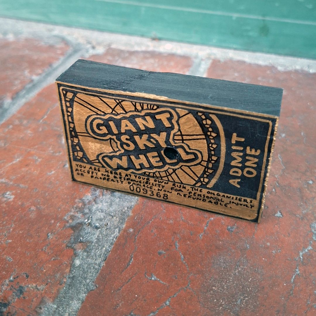 Tegan Iversen Giant sky wheel ticket artwork,  gold 8cm x 5cm x 2cm