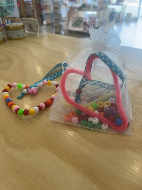 Play, learn, grow with Ms. Flo DIY bead heart decoration